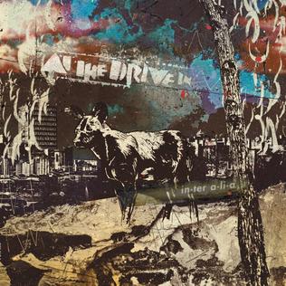 <a href="http://www.ryansrockshow.com/album-details/at-the-drive-in-in-ter-a-li-a">At The Drive-In - In.ter a.li.a</a>